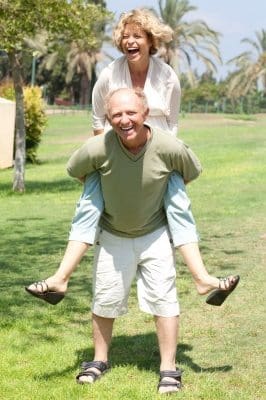 older couple piggyback