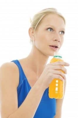 woman drinking sports drink