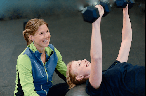 In Home Personal Trainer Dallas TX Smaller In Home Personal Trainer with client on stability ball