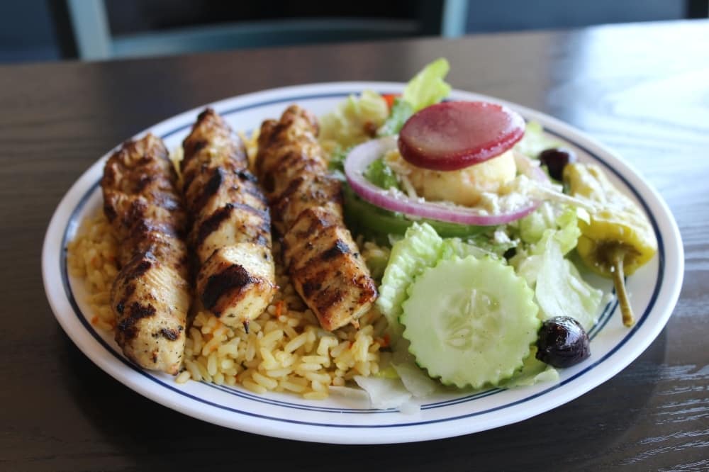 Grilled chicken on a skew and veggies