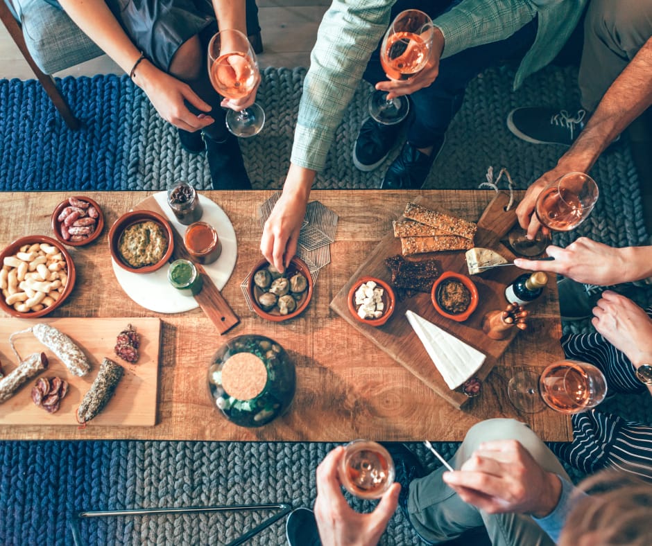 food awareness group gathered around table eating