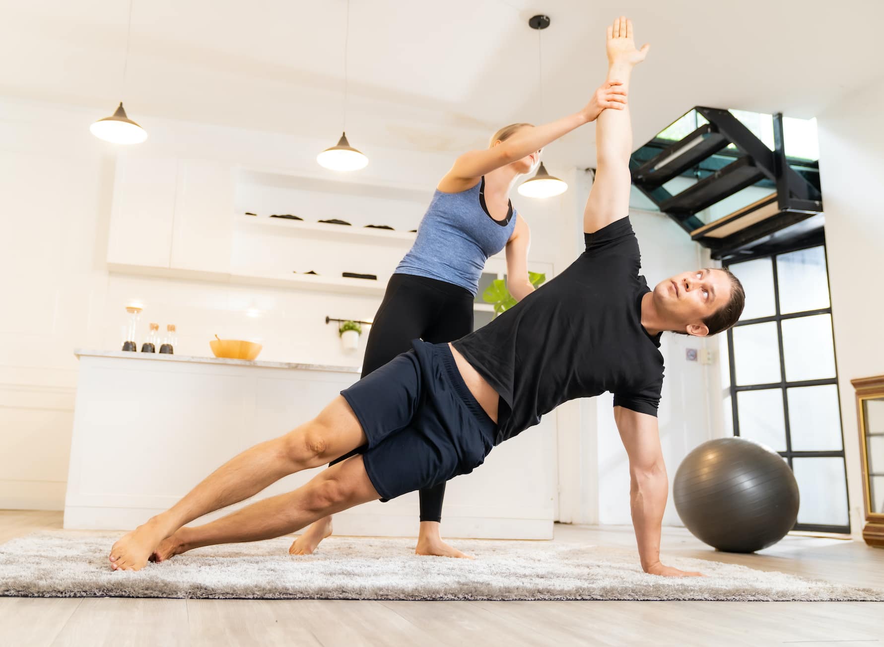 male client with female in home personal trainer