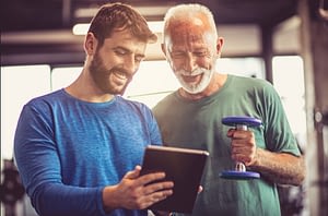 senior personal training client with coach